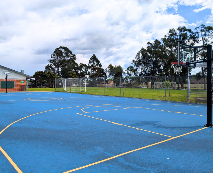 School basketball court near the field